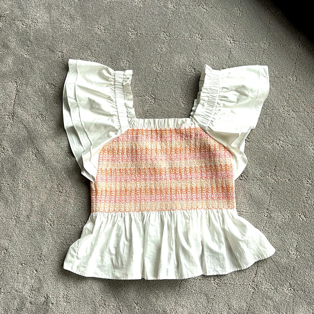 Marie Oliver Winnie Top Signature smocking bodice and peplum waist. NWT size M